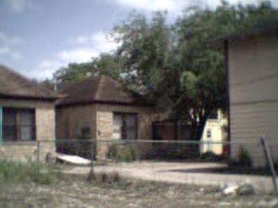 Photograph of the back of Weedguy's house